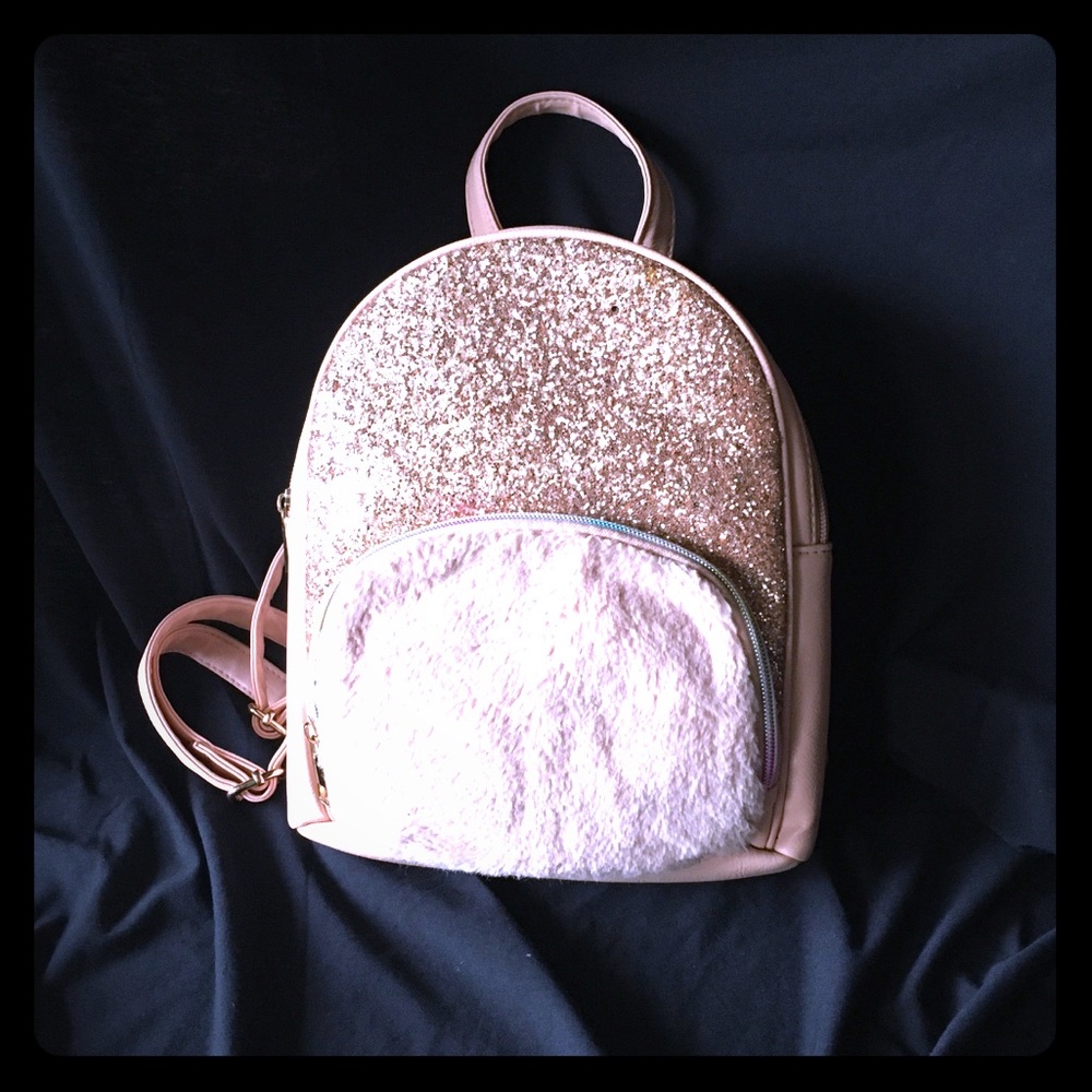 Glitter and faux fur mini backpack purse